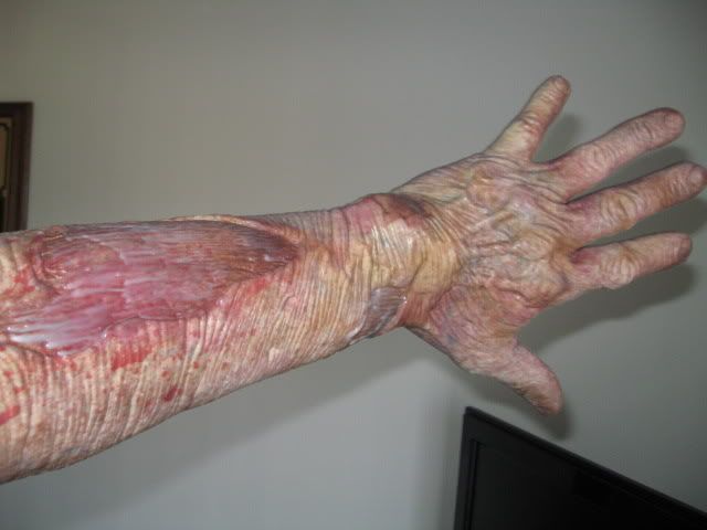 http://i225.photobucket.com/albums/dd211/jimmyjam000/ZombieHands-New041.jpg