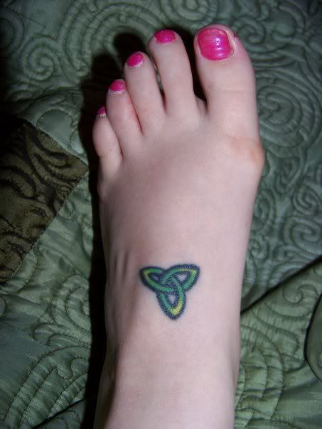 small cross tattoos on foot. Small Triquetra Tattoo on Foot